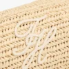 Väska med monogram och kedjerem i raffia Väska med monogram och kedjerem i raffia